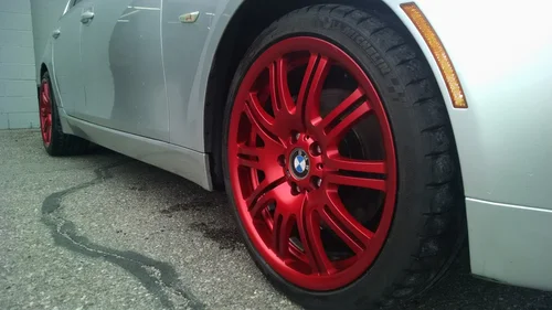 Car wheels with a red powder coating